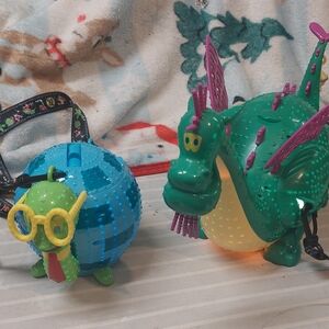 Disneylands main st electrical parade Petes dragon and turtle sipper.